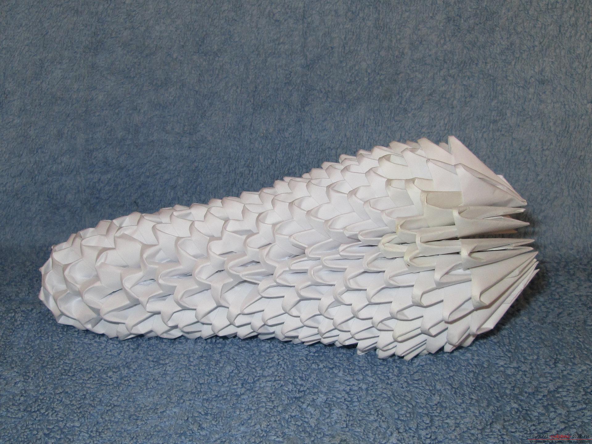 Если вы любите собирать модульное оригами, этот мастер-класс по созданию дельфина из бумаги для вас.. Фото №17